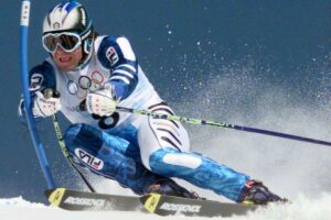 alberto tomba negli anni '90 mentre sia alle olimpiadi d'inverno