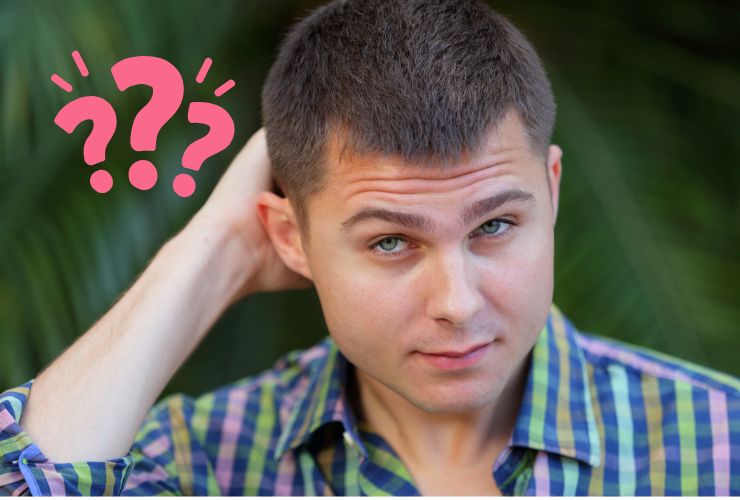 una persona che si gratta la testa e punti interrogativi